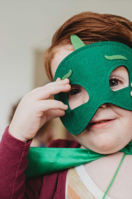 child in hero mask
